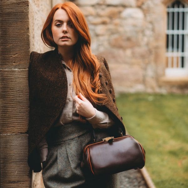 Women's handmade leather Gladstonette shoulder and handbag in Spanish soft hide shiny brown colour.